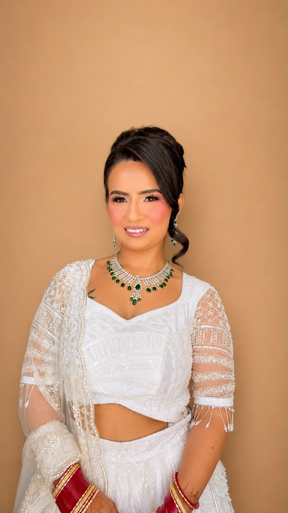 Ivory bridal with emerald necklace