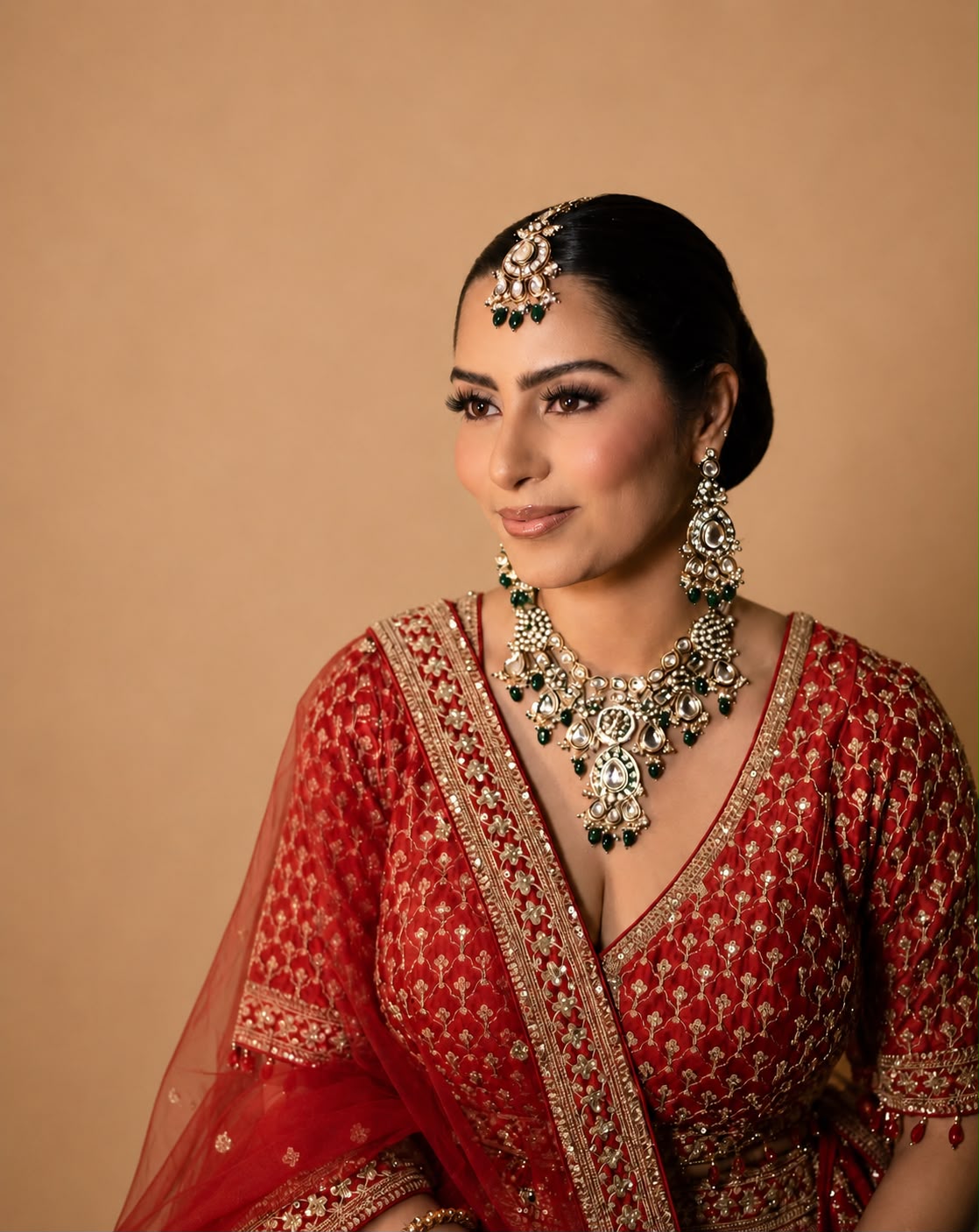 Red bridal side profile with kundan set