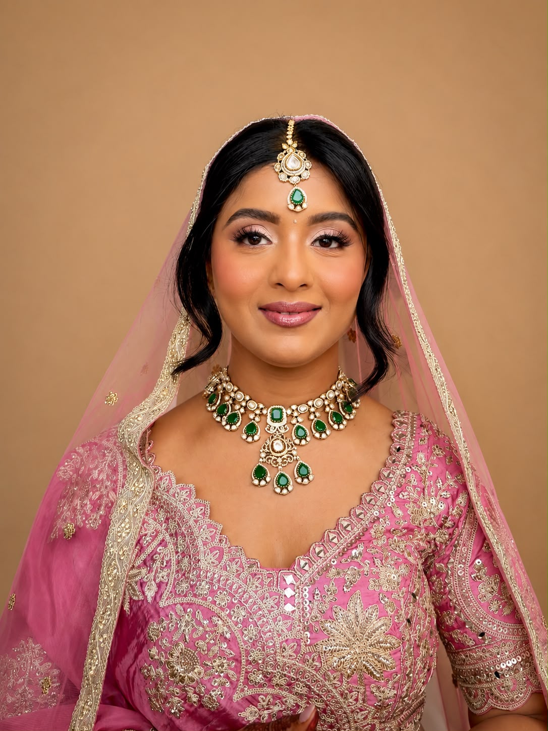 Pink bridal with emerald kundan necklace