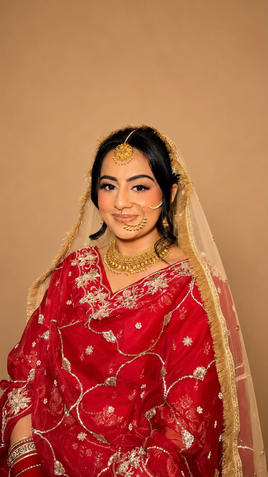 Red bridal with gold nath and choker